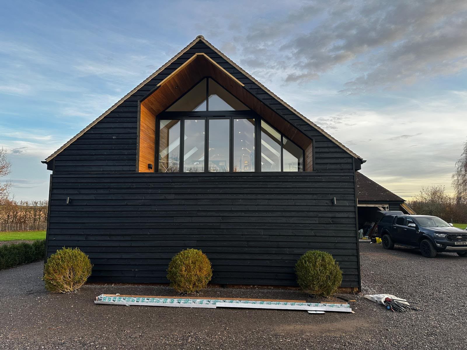 Black timber-clad one-off home